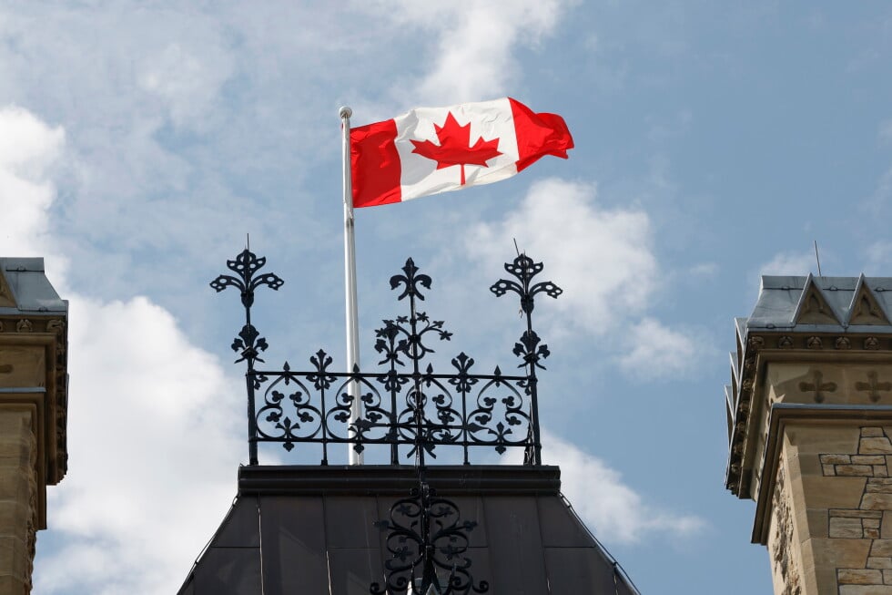 A Canadian flag flies on Parliament Hill in Ottawa on Saturday, Aug. 22, 2026. (Patrick Doyle/The Canadian Press via AP)