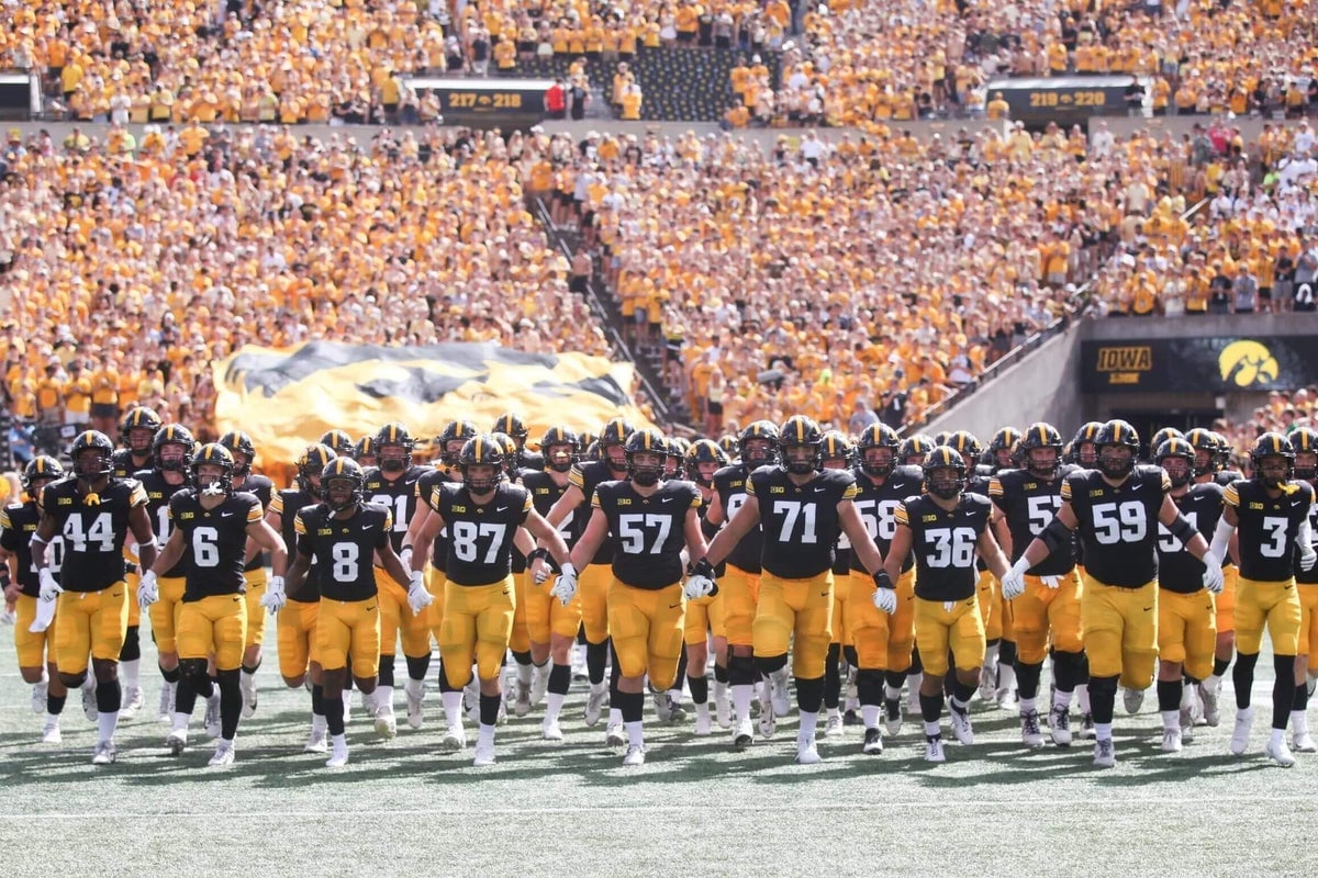 Derek Phillips Dies After Collapsing From Cardiac Arrest in Kinnick Stadium Heat